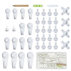 various white plastic objects and tools for making crafts