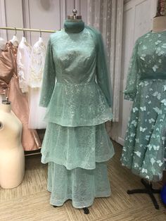 Green Tiered Maxi Dress For Party, Green Tiered Maxi Dress For Evening, Green Ruffled Maxi Dress For Prom, Green Ruffled Prom Evening Dress, Green Ruffled Evening Dress For Prom, Elegant Light Green Maxi Dress For Party, Green Ruffled Maxi Dress For Wedding, Prom Dress Hijab, Maxi Tea