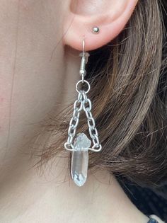 These unique handcrafted earrings are designed specifically for you! Made with natural, raw crystal, they make a perfect statement piece. Clear Quartz is an all around healer. It holds a clarifying nature. Materials: -Thick Silver Chain -Nickel Free Silver Earring Hooks -Raw Clear Quartz Points -20 Gauge Silver Wire Free Shipping on all orders over $35! Handmade in Boone NC with care <3 Follow us on instagram @crystalskydesign for more! Metal Dangle Crystal Earrings, Pierced Dangle Crystal Earrings, Unique Dangle Crystal Earrings With Ear Wire, Metal Long Drop Crystal Earrings For Gift, Gift Metal Crystal Long Drop Earrings, Handmade Clear Crystal Dangle Earrings, Handmade Clear Crystal Drop Earrings, Handmade Clear Quartz Jewelry, Clear Quartz Earring