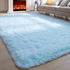 PRICES MAY VARY. Synthetic Fibre 【Ultra Soft Area Rug】 This shaggy rug features ultra soft fluffy velvet surface with thousands of 1.7" plush fibers, sponge middle inner layer, and an anti-slip backing; this cozy shaggy rug is providing you with softness and comfort, Keep your feet away from the icy floor in the cold winter and the scorching heat can also bring you a silky cool feeling. It's really nice to walk, sit or lay on these super soft area rugs 【Premium Material】This modern blue shaggy a Light Blue Rooms, Blue Room Decor, Rug Fluffy, Black Living Room Decor, Soft Bedroom, Carpets For Kids, Light Blue Rug, Area Rug For Living Room, Preppy Room