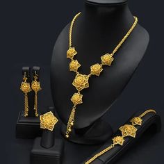 Indulge in luxury with this exquisite Dubai Gold Necklace Set, perfect for wedding parties. With its opulent design and superior craftsmanship, this set features a necklace, bracelet, earrings, and ring. Make a lasting impression and elevate your style with this luxurious jewelry set.' Gold Necklace Set Dubai Design, Turkish Gold Necklace Design, Multi Layered Gold Necklace Dubai, Luxury Gold Bridal Necklace For Eid, Gold Necklace Set Arabic Design, Turkish Gold Jewelry, Gold Set Design, Gold Souk Dubai Necklace, Fashion Jewelry Sets