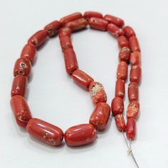 "1\"Strand Rare AA+ Quality-100% Natural Italian Undyed Coral Beads-Handmade Coral Beads-Smooth Polished Red Coral Beads-For Jewelry Making About Item ; Gemstone :- Natural Italian Red Coral Total Carat Weight :- 145 Carat (29-Gram) Length :- 8.5 x 12 MM Width :- 4 x 9 MM Depth :- 3.5 x 8 MM Strand Length :- 17\"Inches Color :- As Seen In Picture PAYMENT POLICY WE ACCEPT PAYMENT THROUGH PAYPAL ONLY. We have chosen PayPal. Because it is the safest and most reliable way of payment which enables shipping to our buyers And protects their interests. Payment must be made within 7 days of purchase Please email us with any questions you have during the transaction. SHIPPING POLICY SHIPPING AND SHIPPING RULES. world wide free shipping. Free shipping charges all over the world. Item will be dispatch Red Coral Polished Beads For Jewelry Making, Red Coral Beads For Jewelry Making, Red Beads And Cabochons For Jewelry Making, Large Red Coral Beads For Jewelry Making, Red Large Beads For Jewelry Making, Red Oval Beads For Jewelry Making, Red Coral Gemstone Beads For Jewelry Making, Red Polished Beads For Spiritual Jewelry, Red Hand-strung Beads For Jewelry Making