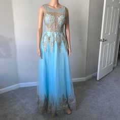 2 Available. Size 4 Tulle Light Blue With Gold Lining Dress New Without Tag Light Blue Sleeveless Dress For Prom, Light Blue Maxi Length Party Gown, Sleeveless Light Blue Party Gown, Blue Sleeveless Spring Evening Dress, Blue Sleeveless Gown For Prom Season, Light Blue Summer Party Gown, Spring Light Blue Sleeveless Evening Dress, Sleeveless Light Blue Evening Dress For Spring, Blue Sleeveless Prom Gown