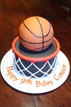 a birthday cake made to look like a basketball