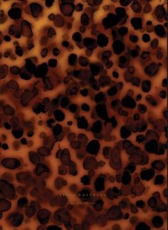 an animal print pattern is shown in brown and black colors, with spots on the surface