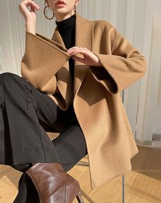 This season's essential coat is designed with a rich wool texture, a shawl collar, and a defining irregular belt. Shawl collar Long sleeves Open front with a leather belt 100% wool Dry clean Unlined Item #1948 Women's wool coat SIZE INFO XS=US2=UK6=EU32 S=US4-6=UK8-10=EU34-36 M=US8-10=UK12-14=EU38-40 ★★Please advise your Height and Weight, I will make sure you choose the right size. Beige Belted Outerwear For Office, Beige Wool Shawl Collar Outerwear, Belted Brown Outerwear For Business, Fall Blazer With Belt And Long Sleeves, Fall Long Sleeve Blazer With Belt, Brown Wool Coat With Lapel Collar For Spring, Elegant Brown Outerwear With Shawl Collar, Winter Office Belted Blazer, Winter Beige Belted Pea Coat