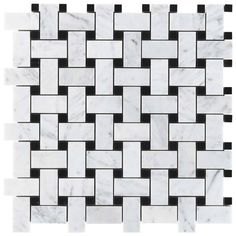 a white marble tile with black and white squares