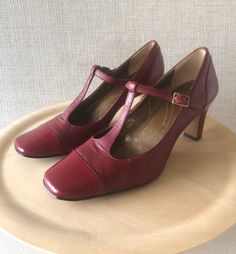 "Vintage Red Mary Janes are the perfect addition to your fall wardrobe. It's square cap toe and heel are in a coordinating patent leather red. They have that vintage spectator feel, gorgeous with socks or tights. *leather *size 6 *by Tahari *2.75\" heel Very Good Condition *faint wear marks in heel (see pics) follow me on IG @midtidestudio fir new listings and fun inspo 🌊" Fitted Red Block Heels, Red Fitted Block Heel Shoes, Patent Leather Heels For Fall, Fitted Patent Leather Heels For Fall, Vintage Fitted Heels With Padded Heel, Red Block Heel Shoes, Red Fitted Square Toe Heels, Classic Red Heels For Fall, Burgundy Fitted Heels With 4-inch Heel