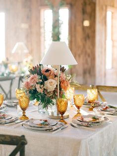 Are you a classic bride looking for traditional and classic wedding table decor ideas? We loved decorating this fall wedding at Boone Hall. For the wedding tables, we added white pendant table lamps for luxury wedding table lighting, amber goblet glasses, and fall florals with greenery, and a white patterned table cloth. All of the wedding table decor created an traditional and timeless wedding aesthetic. For classic wedding table decor ideas and luxury wedding ideas, follow @classicplanninganddesignco! Photo: Katherine & Tyler Photo | Lighting: Lit Charleston Classic Wedding Table Decor, Traditional Fall Wedding, Wedding Table Lighting, Luxury Wedding Ideas, Fall Wedding Table Decor, Fall Wedding Tables