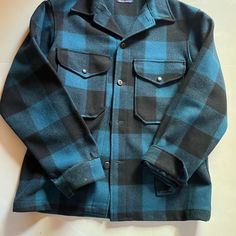 Handsome Pure Wool Button Down Jacket From Pendleton. Two Front Snap Flap Pockets, Pong Sleeves With Button At Cuffs. Unlined. Good Condition. Armpit To Armpit 24" Length 28" Pendleton Mens, Pendleton Jacket, Button Down Jacket, Plaid Jacket, Wool Plaid, Black Wool, Flap Pocket, Down Jacket, Blue Man