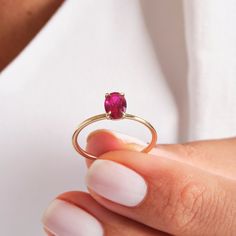 "Here's 14K Gold Pink Ruby Birthstone Ring for Bride. Custom Birth Month Jewelry will be perfect Bridal Gift for Her, Girlfriend and fiancé! We can create Personizer Ring with her birthstone for her Birthday. This Oval Cut Gemstone Ring will be best gift for your wife or mother as well! This 10K Personalized Jewelry is great shower Ring with Stunning and Dainty Birth Stone. This Delicate Gold Ring will be will be either irreplaceable daily ring or special night shower ring!  Pink Ruby Birthstone Classic Birthstone Ring For Proposal, Oval Birthstone Ring For Valentine's Day, 14k Gold Ruby Ring With Round Band, 14k Gold Oval Birthstone Ring As Gift, Oval 14k Gold Birthstone Ring As A Gift, Oval 14k Gold Birthstone Ring Gift, 14k Gold Oval Rings For Valentine's Day, Dainty Oval Ruby Ring With Prong Setting, Classic Ruby Ring For Valentine's Day