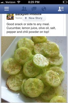 sliced cucumbers on a white plate with pepper sprinkles