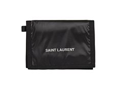 This Saint Laurent trifold wallet in black coated nylon. The front of this wallet features Saint Laurent logo in white, and is trimmed in black nylon. Velcro closure flap opens to five card slots, one zippered coin pocket, and one long bill slot. This slim and sleek trifold is perfect for everyday use, and will hold all of your daily essentials.    Model: 584378  Saint Laurent black trifold wallet  Shiny Nuxx/Rip Stop material (coated nylon)  Flap and Velcro closure    Black nylon interior    Fi Black Rectangular Wallet With Logo, Black Rectangular Wallets With Logo, Black Trifold Wallet For Travel, Black Trifold Travel Wallet, Black Bifold Wallet With Logo, Functional Black Trifold Wallet, Classic Black Trifold Wallet With Zipper, Classic Black Trifold Wallet With Zipper Closure, School Trends