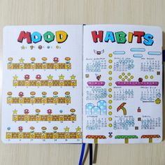 an open notebook with the words'modd habitts'written in colorful letters