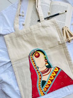 a tote bag with an image of a woman on it