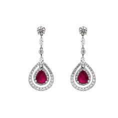 Dangling platinum earrings with red Burmese pear cut ruby 3.61 ct as center stones.  Large round diamond stones at the top are 2.05 ct.  Accent of small round and marquis diamonds are 2.02 ct. Diamonds are natural and in G-H Color Clarity VS. Platinum 950 metal.  Butterfly studs. Width: 1.6 cm Height: 4 cm Weight: 10.5 g #maxjewelryinc #jewelry #jewelries #ruby #rubies #earring #earrings #accessories #fashion #dangling #drop #luxury #diamonds #diamond #bling Red Diamond Drop Earrings, Red Diamond Drop Earrings For Formal Events, Red Diamond Drop Earrings For Formal Occasions, Red Brilliant Cut Diamond Earrings For Wedding, Red Diamond Earrings With Accents For Wedding, Formal Red Diamond Earrings With Brilliant Cut, Formal Red Diamond Drop Earrings, Red Diamond Teardrop Earrings, Red Ruby Diamond Earrings For Wedding