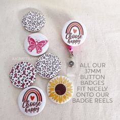 six badges with the words choose happy, all our 3mm button badges fit nicely onto our badge reels