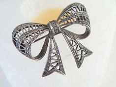 "Beautiful old pin with handmade filigree work. This brooch is larger than most - and will look perfect on a scarf, hat, handbag, sweater, jacket, etc. This sweet brooch is from the 1950's.  Measures Approx 1-5/8\" x 1-1/4\" Marked, 925 for sterling silver Condition, Good with normal signs of wear Weight 10.9 grams" Antique Style Pins As Gifts, Handmade Victorian Brooches For Gift, Handmade Victorian Brooches As Gifts, Classic Brooch Pins As Gift, Classic Filigree Brooches As Gifts, Vintage Handmade Brooches For Gifts, Elegant Brooches With Intricate Design For Gift, Handmade Elegant Pins For Gifts, Elegant Handmade Pins As Gifts