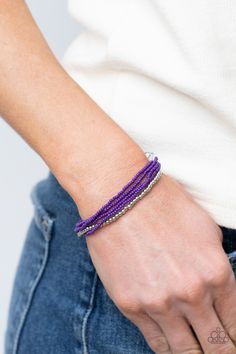 A single accent strand of silver beads merges with multiple strands of purple seed beads for a simple yet trendy look. Features an adjustable sliding knot closure.

 Sold as one individual bracelet. Live Text, Adjustable Sliding Knot, Sliding Knot Closure, Purple Bracelet, Purple Necklace, Sliding Knot, Paparazzi Accessories, Seed Bead Bracelets, Paparazzi Jewelry