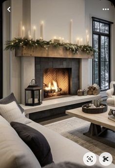 a living room filled with furniture and a fire place