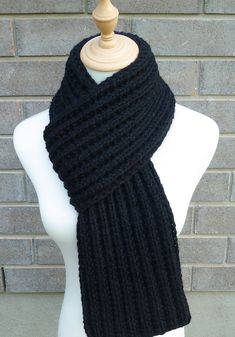 This beautiful hand knitted scarf is made with high quality soft wool blend yarn (80 Alpaca Wool, 20% Nylon). Classic ribbed pattern, it looks the same on both sides. The scarf can be worn in multiple ways. Amazing color for the fall/winter season. It goes with everything. Measures: 71" (180 cm) long x 7" (18 cm) wide. From a smoke-free home. Care instructions: Hand wash in cool water and dry flat. Hand Knitted Scarf, Mens Scarf, Scarf Wool, Hand Knit Scarf, Black Scarf, Crochet Design, Mens Scarves, Long Scarf, Alpaca Wool