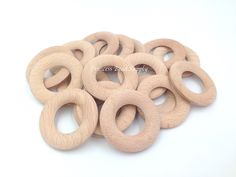 several wooden rings on a white background