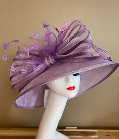 Purple Feathered Hat For Kentucky Derby, Purple Feathered Hats For Summer, Elegant Adjustable Top Hat With Feather Trim, Elegant Purple Feathered Headpiece, Wide Brim Feathered Adjustable Fascinator, Adjustable Wide Brim Fascinator With Feathers, Wide Brim Fascinator With Feathers, Elegant Purple Flat Brim Hat, Adjustable Feather Hat For Church