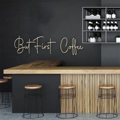 a counter with four stools in front of it and the words buffet first coffee written on the wall