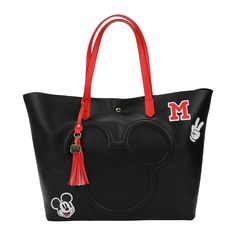 Carry a piece of Disney magic wherever you go with this officially licensed Disney Mickey Mouse Mixed Icons Tote Bag. Crafted from high-quality synthetic leather, this tote bag is not only stylish but also durable, making it a perfect accessory for Disney enthusiasts. The bag showcases an array of iconic Mickey Mouse patches that add charm and nostalgia. An embossed Disney logo on the bag further enhances its elegance. The tote comes complete with a stylish tassel keyring, adding a touch of whim Disney References, Disney Pride, Disney Tote Bags, Disney Tote, Mickey Mouse Bag, Mickey Mouse Silhouette, Tassel Keyring, Cosmetic Bag Set, Disney Bag