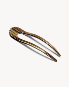 A classic French hair pin, hand-sculpted in fine Italian acetate. Recommended for all hair textures. Effortless Updo, Wooden Hair Pins, French Pin, French Hair Pin, Hair Textures, Hoop Charms, French Hair, Summer Sunglasses, Hair Stick