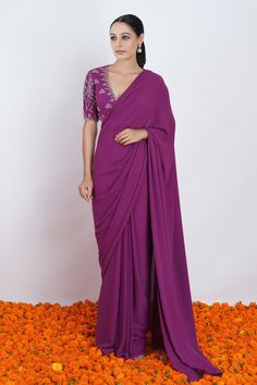 Purple viscose georgette saree. Paired with deep V neck blouse with floral pattern zari and thread embroidery. Component: 2 Pattern: Embroidered Type Of Work: Thread and Zari Work Neckline: Deep V Neck Sleeve Type: Half Sleeves Fabric: Viscose Georgette Color: Purple Other Details: Illusion back Inverted V cut hem on blouse Occasion: Wedding,Destination Wedding - Aza Fashions Graduation Saree, Simple Saree Blouse Designs, Stylish Kurtis Design, New Saree Blouse Designs, Purple Saree, Traditional Blouse Designs, Fancy Sarees Party Wear, Simple Sarees, Half Sleeve Blouse