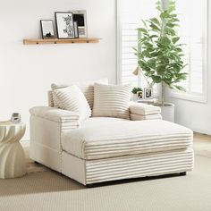 a living room with a large white couch