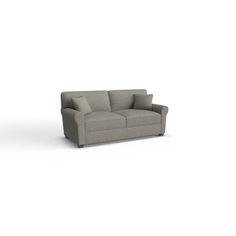 a gray couch sitting on top of a white floor