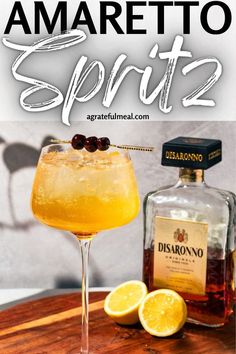 an image of a drink with lemons on the side and text that reads amarettoo spirit 2