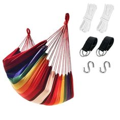 a hammock with two hooks and several colors of fabric hanging from the side