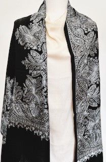 Our Embroidered Shawl features fine embroidery on soft 100% merino wool. Specialty piece. This classically beautiful shawl showcases the intricate embroidery traditions of Northern India with stunning embroidery in metallic tones on a black base. Suitable for a black tie event, evening out, dinner party. Can change the look of last year's dress or pantsuit. A formal living room, drape over the back of the couch. The high quality and elegance of our embroidered shawls make them treasures that wil Elegant Black Pashmina Shawl For Winter, Elegant Black Pashmina Shawl For Formal Occasions, Elegant Shawl With Intricate Embroidery, Black Pashmina Shawl For Formal Occasions, Black Formal Pashmina Shawl, Elegant Black Festive Shawl, Elegant Black Pashmina Shawl For Festive Occasions, Elegant Black Scarves For Festive Season, Elegant Black Scarf For Festive Season