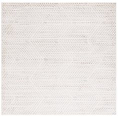 a white rug with an arrow pattern on it