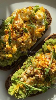 an open face sandwich with eggs and avocado on it is sitting on a white plate