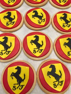 cookies decorated with the symbols of cars and horses