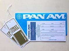 a pair of luggage tags are attached to a bag tag that says, pan am