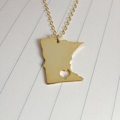 All of our products are handmade,Minnesota state necklace is made of solid 925 Sterling Silver / 18k gold plated / white gold platedThe heart could engrave where your city location is (The heart could engrave where your city location on your state,If you no offer the city name will be default as agree to follow our designers views )This is the popular USA state necklace . With your birth in state shaped necklaces will be the commemorative value things.Pendant suspends from a Link chain connected Japanese Jewelry, State Necklace, Necklace Charms, Minnesota State, Necklace Gold, A Heart, Solid 925 Sterling Silver, Heart Necklace, Lovely Gift