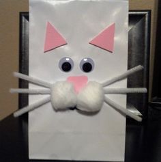 an image of a cat made out of paper on a computer screen with eyes and nose