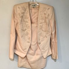 This Long Sleeve Formal Vintage Suit Is A Pale Pink With Beading On The Jacket. This Is A Unique Suit That Will Look Stunning At Any Event. Vintage Long Sleeve Skirt Suit For Formal Occasions, Elegant Pink Three-piece Suit For Formal Occasions, Vintage Formal Lined Skirt Suit, Vintage Long Sleeve Single Breasted Skirt Suit, Vintage Single-breasted Long Sleeve Skirt Suit, Vintage Suits, Formal Suits, Pale Pink, Vintage Dresses