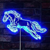 a neon horse running on a pole in front of a brick wall