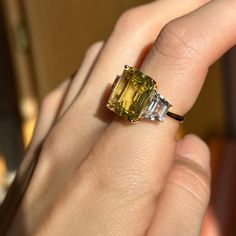 Effy designer, estate, 14KT yellow gold emerald-cut, large citrine and trapezoid white topaz ring. Size 7 Can be resized for an additional fee Weight: 5 grams Citrine stone measures: 14mm x 12mm Trapezoid white topaz measures 9.5mm x 6mm x6mm Stamped 14K & hallmarked Effy Very Good Condition Luxury Elegant Yellow Sapphire Topaz Ring, Topaz And Citrine Ring, Luxury Yellow Gold Emerald-cut Crystal Ring, Luxury Citrine Topaz Ring With Emerald Cut, Yellow Topaz Emerald-cut Ring In Fine Jewelry, Yellow Emerald Cut Topaz Ring In Fine Jewelry Style, Yellow Emerald-cut Topaz Ring Fine Jewelry, Yellow Emerald-cut Topaz Ring, Emerald Cut Yellow Topaz Ring For Wedding