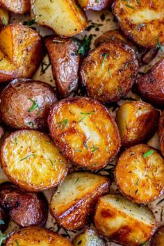 roasted potatoes with herbs and seasoning on top