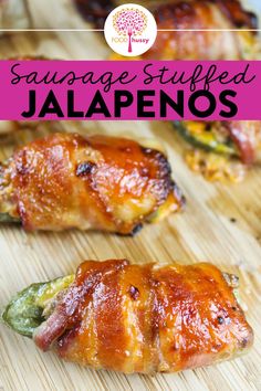 grilled jalapenos on a cutting board with text overlay that reads sausage stuffed jalapenos