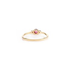 This is part of Chairish’s Fine Jewelry assortment.  Dainty Three Stone Garnet Promise Ring in 14K Gold featuring natural garnet of 0.56 carats. The gorgeous handcrafted ring goes with every style. Garnet gemstone restores balance. Designed with a three round cut garnet that makes it a perfect fit to wear it on your occasion or style it with any of your basic outfit to give it a glam. This is a perfect Garnet Promise Ring. It can be a Bridal Shower Gift, Ring Gift, Gift For Sister, Mother Daught Classic Ruby Stackable Rings With Gemstones, Ruby Birthstone Ring With Round Band, Classic Tourmaline Rings For Anniversary, Classic Ruby Gemstone Stackable Rings, Fine Jewelry Ruby Birthstone Ring With Round Band, Ruby Ring With Center Stone In 14k Gold, Classic Garnet Birthstone Promise Ring, Garnet Birthstone Promise Ring In Fine Jewelry Style, Garnet Cluster Promise Ring In Fine Jewelry Style