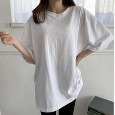 "Women's 100% cotton simple boxy long half-sleeve shirts Slight open cut at side for casual and stylish design Size One size, good for US 4-12 Length 74cm /29\" Chest width 56cm /22\" Sleeve length 36cm /14\" *Model Ht 5'6\" /168cm Fabric and Care Cotton 100% Machine washable and tumble dry Made in S Korea" Everyday Cotton Tops With 3/4 Sleeve, Trendy Cotton Half Sleeve Tops, Boxy Solid Cotton Tops, Trendy Cotton Top With 3/4 Sleeves, Trendy Cotton Half-sleeve T-shirt, Trendy Cotton Half Sleeve Shirt, Casual Cotton Top With 3/4 Sleeves, Casual Cotton Tops With 3/4 Sleeves, Trendy Cotton T-shirt With 3/4 Sleeves