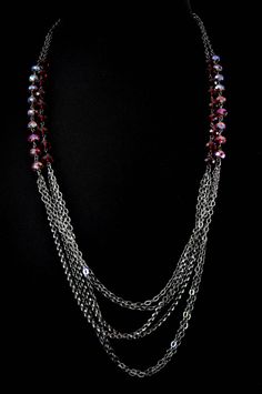 Light chain layered necklace with Red/Siam Swarovski crystals. Makes a great handmade gift to give on birthdays, holidays, on valentine's day or just to say thank you. Can be worn symmetrically or asymmetrically around the neck. Great for layering! Each necklace is packaged in a box, ready for gift giving. Matching earrings: https://anelladesigns.com/collections/catalogue/products/red-crystal-teardrop-earring-with-white-pearls * * * * * * * * * * * * * * * * * * * * * * * See a full description Party Multi-strand Crystal Necklaces With Faceted Beads, Multi-strand Faceted Beads Crystal Necklaces For Party, Multi-strand Faceted Beads Crystal Necklace For Party, Beaded Chain Jewelry For Valentine's Day Party, Valentine's Day Beaded Chain Party Jewelry, Valentine's Day Party Jewelry With Beaded Chain, Red Double Strand Jewelry With Faceted Beads, Multi-strand Crystal Beaded Necklace For Gift, Multi-strand Faceted Beads Party Necklace